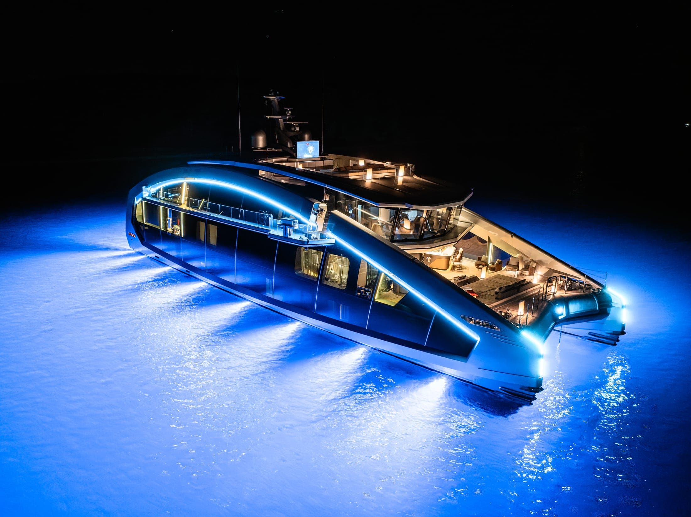 This Is It futuristic power catamaran underway at night