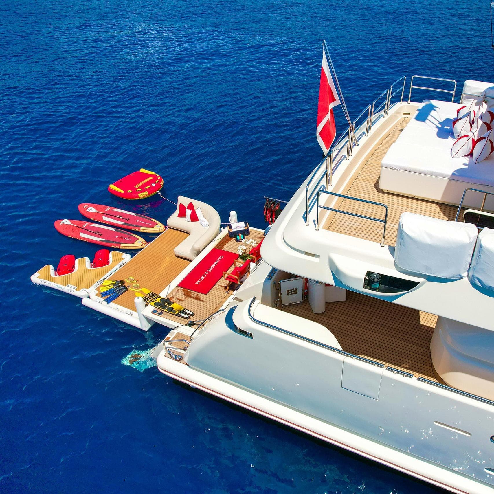 Aerial drone view of charter yacht underway