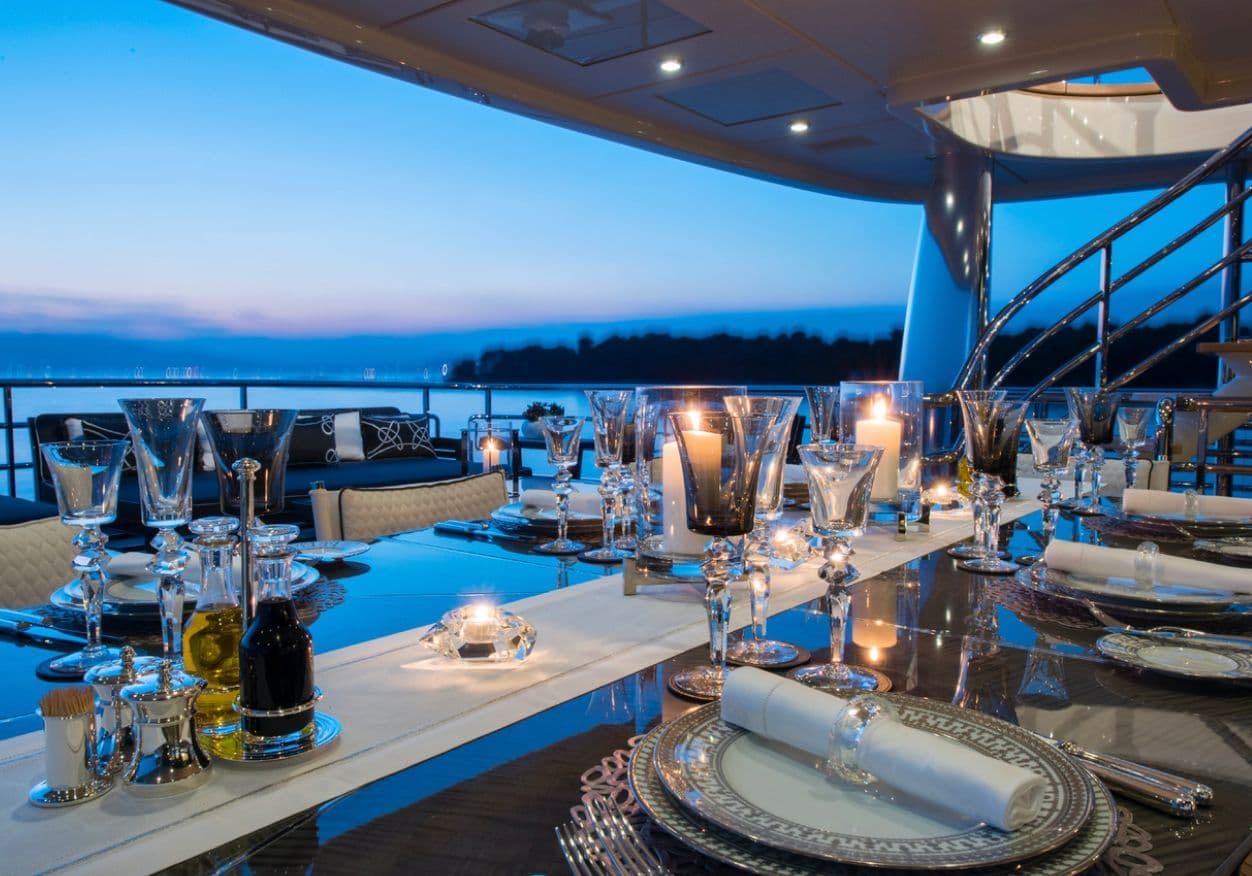 MY Elixir aft deck dining set for sundown