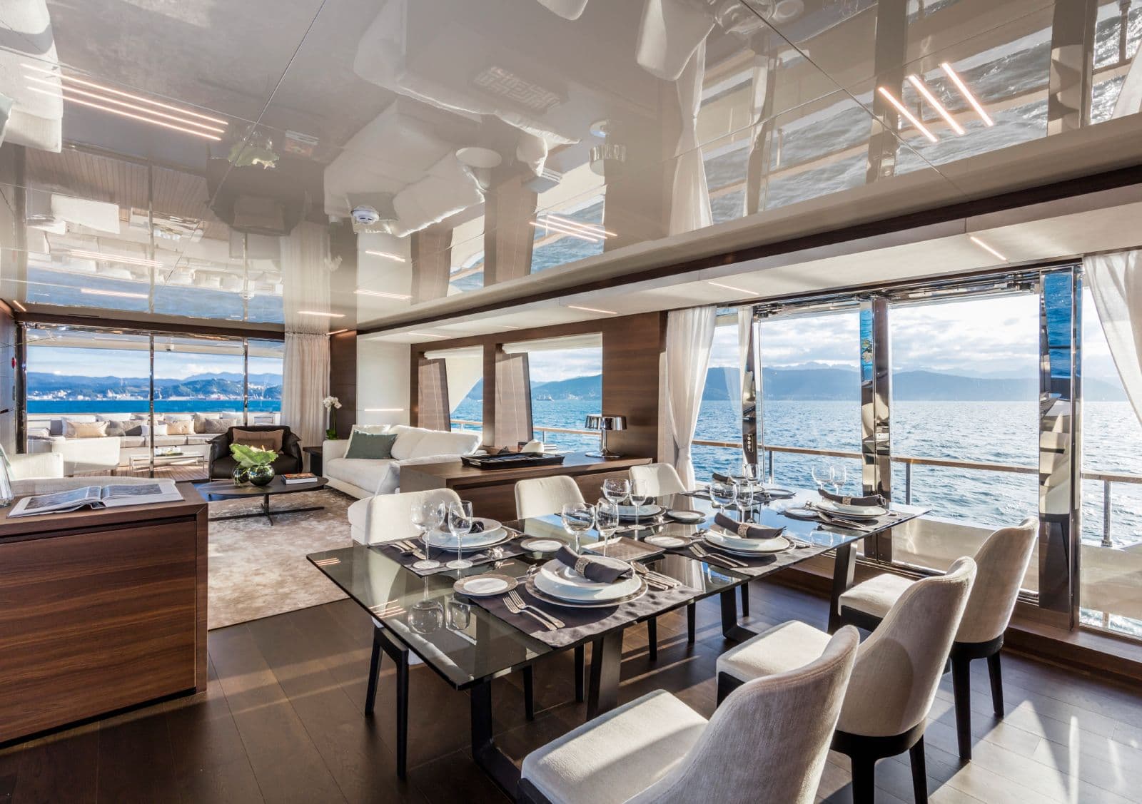 Navetta 33 saloon and dining area with panoramic sea views